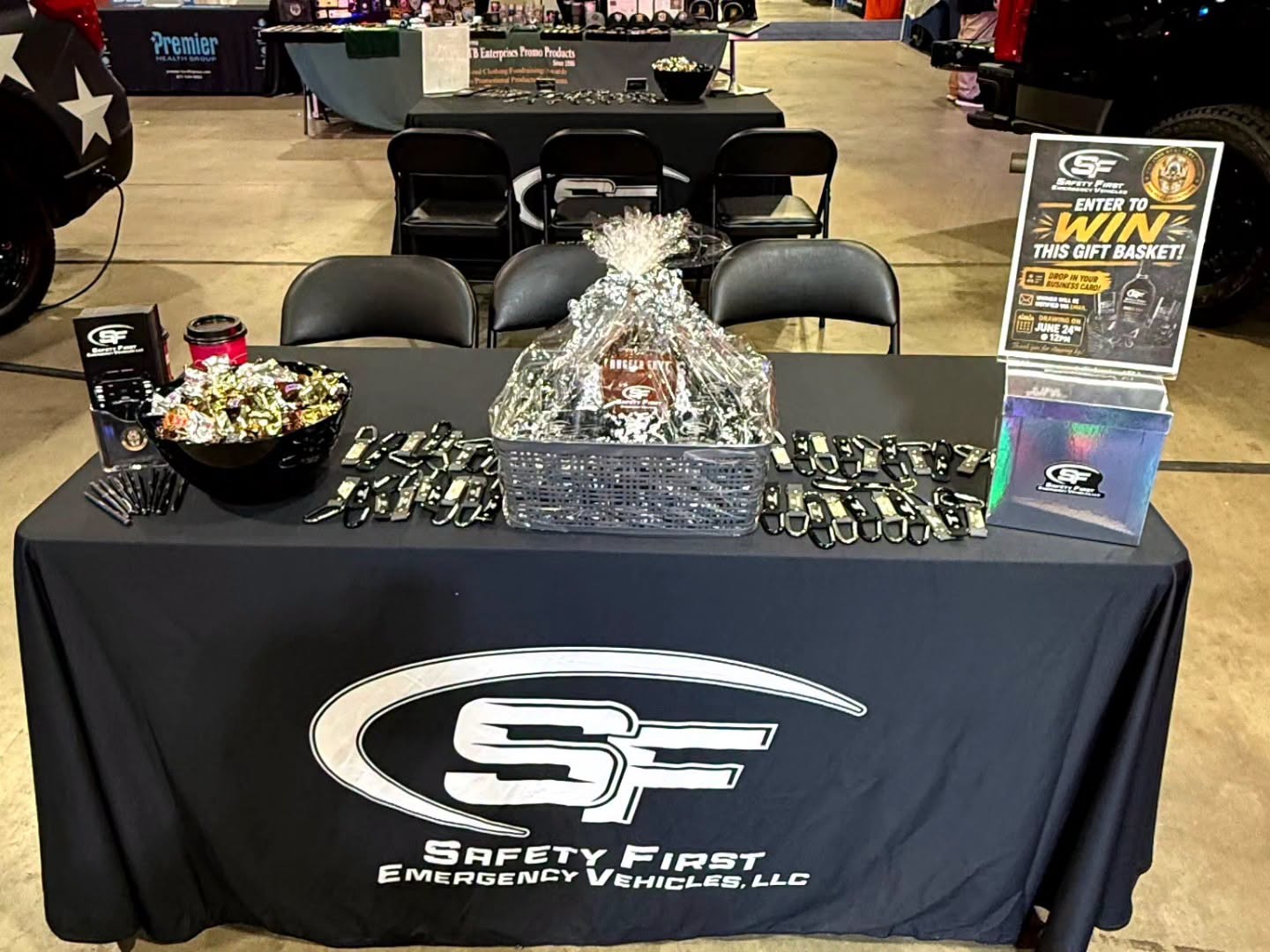The SafetyFirst display table with branded giveaways and an enter-to-win gift basket.